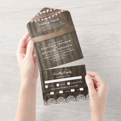 3 in 1 Rustic Baby's Breath Wedding All In One Invitation - A 3 in 1 rustic country chic wedding trifold invitation featuring a rustic wood barrel background, twinkle string lights, a baby's breath floral design, your monogram, wedding details, wedding invite, and a meal rsvp postcard for your guests to tear off and send back.