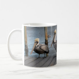 3 Pelicans in a row Coffee Mug
