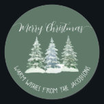 3 Pine Trees Rustic Sage Green Merry Christmas Classic Round Sticker<br><div class="desc">These sage green colored holiday stickers are perfect as envelope seals or gift tags. They feature a rustic watercolor design with three snow covered pine, fir, or spruce trees and elegant script calligraphy lettering reading: Merry Christmas! There is space for a short note or message below. Optimized for round shaped...</div>