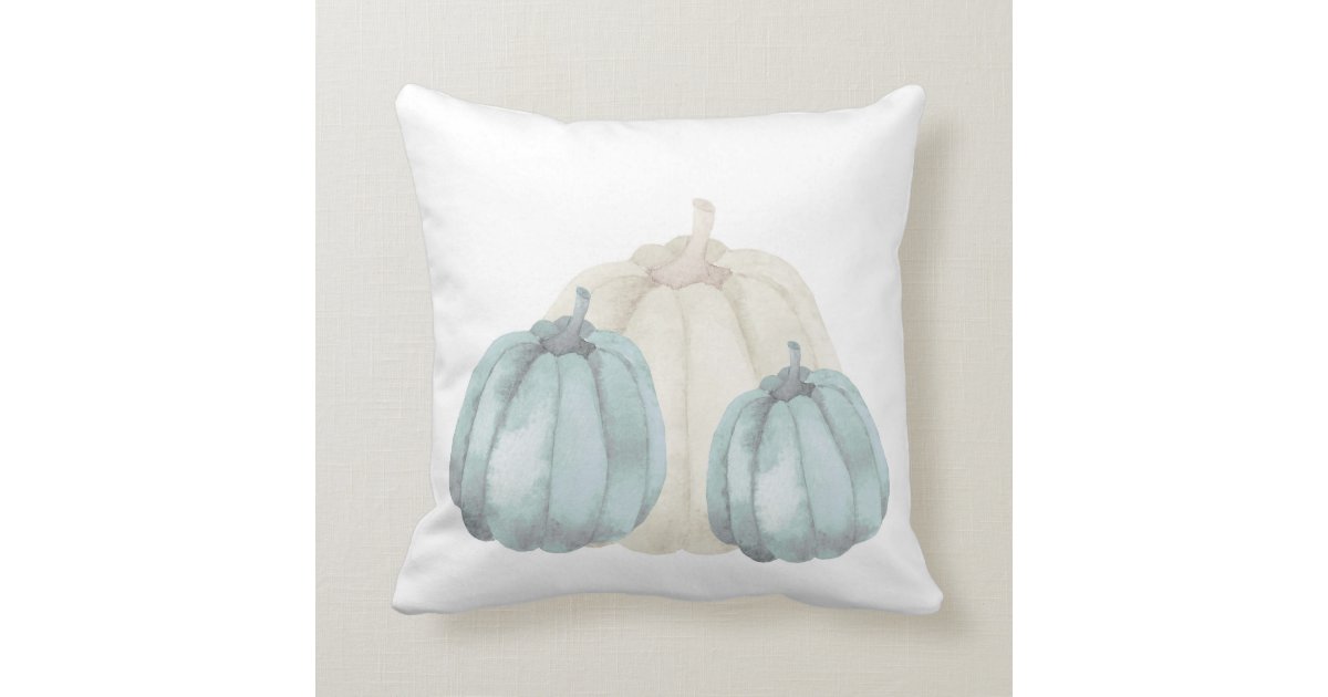 A White Pillow With Three Pumpkins On It And The Words Happy Halloween