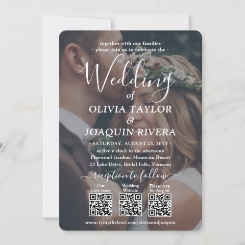 3 QR Codes Modern All-in-One 2 Photo White Wedding Invitation - Invite family and friends to a simply elegant wedding celebration with a stylish 2 photo all-in-one invitation with QR code RSVP. With just one card you can invite wedding guests to your upcoming special day celebration, provide all of the important information (such as directions, registry, hotel accommodations), and let the website keep all of the rsvp's organized. No additional enclosure cards are needed. Pictures and all wording are simple to personalize to include any details of your choice. (IMAGE PLACEMENT TIP: An easy way to center a photo exactly how you want is to crop it before uploading to the Zazzle website.) The modern minimalist black and white design features two pictures of the engaged couple, 3 custom QR codes, chic typewriter style typography, and trendy handwritten script calligraphy. By scanning a QR code with a phone camera, guests are sent directly to the wedding website for more details and to reply to the invitation. An online rsvp process reduces the chance that cards will be lost in the mail. It's also more versatile, in that you can ask for more detailed information, such as meal choices, food allergies, and song requests. All response information can be customized or deleted. This invitation is a stylish way of adding simplicity to your upcoming special day celebration. Congratulations to the bride and groom!