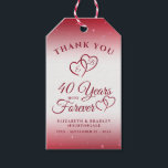 40th Anniversary Monogram Heart YEARS INTO FOREVER Gift Tags<br><div class="desc">Thank 40th wedding anniversary celebration guests from the special couple with these ruby red and white personalized Thank You favor tags featuring an elegant calligraphy script typography design of 40 YEARS INTO FOREVER accented with interlocking linked hearts with monogram initials and confetti against a ruby red faux brushed metallic background....</div>