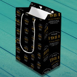 40th Birthday 1984 Black Gold Chic Elegant Medium Gift Bag<br><div class="desc">40th Birthday Chic 1984 Themed Black & Gold Elegant Gift Bags. Celebrate the journey of the vintage years with our 40th Birthday 1984 Black and Gold Chic Elegant Gift Bags. Wrapped in class and elegance, these high-quality gift bags offer a fully personalized touch, reflecting the chic vibes of the birthday....</div>