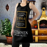 40th Birthday 1984 Name Elegant Black Gold Chic Apron<br><div class="desc">Elegant Black & Gold Chic Apron - 40th Birthday 1984 Name Personalized Kitchen & BBQ Essentials. Celebrate a fabulous birthday with style and practicality! This Elegant Black & Gold Chic Apron, personalized for those born in 1984, is the perfect accessory for the culinary enthusiast in your life. Its eye-catching design,...</div>