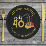 40th Birthday Party Custom Music Guitars Rocks 40 Paper Plates<br><div class="desc">Custom Rocks 40 gold modern typography 40th birthday party can cooler with musical notes and three cool psychedelic colorful guitar designs on black background. Electric guitar, acoustic guitar and acoustic guitar art illustration in vibrant colors. This easy to use template to change the age and name creates the perfect party...</div>
