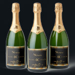 40th birthday party elegant black and gold sparkling wine label<br><div class="desc">A wine or sparkling wine bottle label for an elegant black and gold themed 40th birthday party. Templates for a name, age 40, date of birth and date of the anniversary. Golden colored letters. Black background color and a faux gold frame. With classic swirl decor. You can change the background...</div>