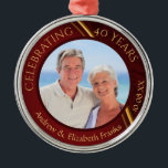 40th Wedding Anniversary Ruby Photo Metal Ornament<br><div class="desc">Commemorate a 40th wedding anniversary (or ANY anniversary by changing the number in the text field) with this beautiful, modern keepsake holiday ornament with a ruby red and gold background and the title "Celebrating 40 Years." Personalize with names and date or any text you desire. (PHOTO TIP: For fastest/best results,...</div>