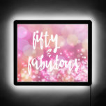 50 & Fabulous, 50th Birthday Pink Glamour LED Sign<br><div class="desc">NewParkLane - Glamorous Milestone LED Sign,  with fun quote 'Fifty & Fabulous' in a fun,  script typography,  against a pink sparkling background. 

Check out this collection for matching items! Do you have specific personal design wishes? Feel free to contact me!</div>