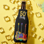 50 Rocks 50th Birthday Party Bottle Cooler<br><div class="desc">50 Rocks 50th birthday party bottle cooler with three cool watercolor guitar designs on black background. An electric guitar with Fire flame pattern and red pick guard, a multicolored semi acoustic guitar and a psychedelic classic acoustic guitar art illustration with personalized black and gold modern cool typography. This easy to...</div>