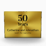 50 Years Wedding Anniversary Gold Black Elegant Acrylic Award<br><div class="desc">This elegant keepsake honors a couple's 50th wedding anniversary. A large number 50 is above the word Years. Then there's a line of text for the names of the husband and wife. The bottom line is for the dates they've been married. Black display text is on a faux (not foil)...</div>