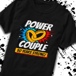50th Anniversary Married Couples 50 Years Strong T-Shirt<br><div class="desc">This fun 50th wedding anniversary design is perfect for couples married 50 years to celebrate their marriage! Great to celebrate with your husband or wife or for your parent's 50 year wedding anniversary party! Features "Power Couple - 50 Years Strong!" wedding anniversary quote w/ joined wedding rings in a blast...</div>