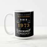 50th Birthday 1973 Add Your Name Legendary Coffee Mug<br><div class="desc">For those born in 1973 and celebrating their birthday we have the ideal birthday mug. The black background with a white and gold design is simple and yet elegant with a retro feel. Easily customize the text using the template provided. More gifts and party supplies available with the "Legendary" design...</div>