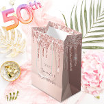 50th birthday 50 rose gold glitter drips name medium gift bag<br><div class="desc">A gift bag for a feminine and glamorous 50th birthday.  A faux rose gold background with an elegant faux rose gold glitter drips,  paint drip look. The text: The name is written in dark rose gold with a modern hand lettered style script. Tempate for a date and age 50.</div>