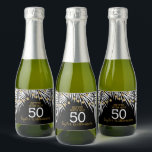 50th Birthday Black and Gold Mini Sparkling Wine Label<br><div class="desc">Make your own mini sparkling wine bottle labels personalized with your name and age featuring white palm tree fronds and strands of lights on a black background - CHANGE BACKGROUND COLOR to anything. All text,  fonts and font colors can be modified. See MATCHING items in our store.</div>