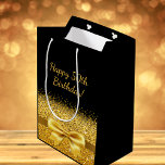 50th birthday black gold name elegant medium gift bag<br><div class="desc">Elegant,  classic,  glamorous and feminine style party gift bag.  A gold colored ribbon and bow with golden glitter and sparkle,  a bit of bling and luxury for a birthday.  Black background</div>
