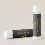50th Birthday Black Gold Personalized Birthday Lip Balm<br><div class="desc">This is an elegant personalized, black and gold 50th birthday design. This modern typography design is in classic black and gold. It has the text "Hello 50" in trending typography and space for you to add your name. This stylish design is perfect for a chic and unforgettable 50th birthday party...</div>