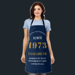 50th Birthday Born 1973 Blue Gold Lady's Apron<br><div class="desc">A personalized classic blue apron design for that birthday celebration. Add the name to this vintage retro style blue, white and gold design for a custom birthday gift. Easily edit the name and year with the template provided. A wonderful custom birthday gift. More gifts and party supplies for that party...</div>