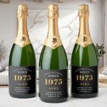50th Birthday Name 1975 Black Gold Elegant Chic Sparkling Wine Label<br><div class="desc">Vintage Birthday Black & Gold Elegant Label. Celebrate your milestone with our exclusive sparkling wine birthday label. The meticulously designed label with stunning black and gold hues effortlessly enhances the visual appeal of your favorite sparkling wine. The year prominently featured on the label, adds a nostalgic throwback to the year...</div>