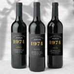 50th Birthday Name Year  Black Gold Elegant Chic Wine Label<br><div class="desc">Vintage 50th Birthday Black & Gold Elegant Wine Label. Celebrate your milestone with our exclusive Vintage 50th birthday wine label. The meticulously designed label with stunning black and gold hues effortlessly enhances the visual appeal of your favorite wine. The year, prominently featured on the label, adds a nostalgic throwback to...</div>