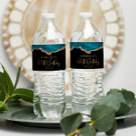 50th Birthday Party Teal Blue Gold Agate Water Bottle Label<br><div class="desc">These chic 50th birthday water bottle labels feature a watercolor image of an agate geode in shades of teal blue with faux gold glitter highlights. The words "50th Birthday" appear in faux gold glitter in a decorative modern handwriting font. Customize it with the name of the guest of honor and...</div>