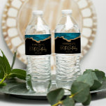 50th Birthday Party Teal Blue Gold Agate Water Bottle Label<br><div class="desc">These chic 50th birthday water bottle labels feature a watercolor image of an agate geode in shades of teal blue with faux gold glitter highlights. The words "50th Birthday" appear in faux gold glitter in a decorative modern handwriting font. Customize it with the name of the guest of honor and...</div>