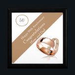 50th Wedding Anniversary  Gift Box<br><div class="desc">This lovely Anniversary gift box is perfect for a couples 50th Wedding Anniversary. The suggested theme for this anniversary is gold. With this in mind I have featured two gold wedding rings in the design with a banner and editable text so it can be made truly personal. Perfect to hold...</div>