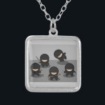 5 Little ninjas Silver Plated Necklace<br><div class="desc">5 cute little ninjas in various stances and holding a variety of weapons,  including a dagger,  some nunchucks,  and throwing  stars.</div>