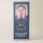 60th Birthday 1963 Legend Blue Gold Name Photo Ret Retractable Banner<br><div class="desc">For those celebrating their birthday we have the ideal birthday party banner with a vintage feel. The blue background with a white and gold vintage typography design is simple and yet elegant with a retro feel. Easily customize the text of this birthday gift using the template provided. See in store...</div>