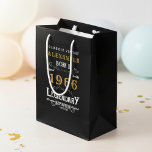 60th Birthday 1966 Add Name Legend Black Gold Medium Gift Bag<br><div class="desc">Celebrate a special milestone with this 60th birthday born 1966 Legendary Black Gold Medium Gift Bag. Printed with a classic design in black, and gold, this gift bag is perfect for holding presents, cards, and other special tokens for the big day. Add your loved one's name to the bag for...</div>