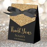 60th Birthday Gold Glitter Thank You Favor Boxes<br><div class="desc">This fabulous modern 60th Birthday Gold Glitter Thank You favor box with sparkling gold glitter, Thank You in a trendy script font and the birthday girl's name in gold with an elegant black bow would be perfect for your event. It would be great for a candy station, on a thank...</div>