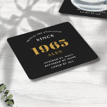 60th Birthday Name 1965 Black Gold Elegant Chic Square Paper Coaster<br><div class="desc">Premium 60th Birthday Black and Gold Personalized Paper Coasters - Celebration Elegance. Celebrate a milestone birthday in style with our chic, premium-quality, 60th Birthday paper coasters. Exquisitely designed with a striking black and gold color scheme, these coasters add a touch of luxury and sophistication to any 60th birthday bash. Express...</div>