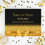 60th birthday party black gold bow save the date postcard<br><div class="desc">Elegant, classic, glamorous and feminine style 60th birthday party save the date postcard. A faux gold colored ribbon and bow with faux golden glitter and sparkle, a bit of bling and luxury for a birthday. Black background. With the text: Save the Date on front written with a modern block letters....</div>