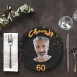 60th birthday party black gold photo paper plates<br><div class="desc">A paper plate for a 60th birthday party for guys. Template for your photo.  Black background and the text: Cheers! 60.  The text is written with a trendy faux gold balloon script.  Golden confetti as decoration.
Matching paper napkins are available in our store!</div>