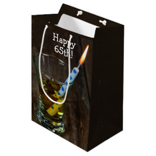 65th Birthday Candle in Whiskey Glass Medium Gift Bag