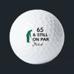 65th Birthday Funny Custom Golf Ball with Name<br><div class="desc">Celebrate a milestone in style with this funny and personalized golf ball design. Featuring the phrase “65 & Still On Par” with a golfer silhouette, it’s the perfect way to honor an avid golfer turning 65. Add a custom name for a personal touch and create a memorable keepsake that combines...</div>