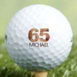 65th birthday golf balls 65 years golfer wood gift<br><div class="desc">65th birthday golf balls 65 years golfer wood gift. Celebrate a 65th birthday with this unique, rustic golf ball featuring a bold "65" in a wood texture design and customizable name below. Perfect for the golfer who appreciates a natural, earthy aesthetic, this personalized golf ball makes an ideal gift or...</div>
