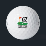 67 Years and Still Swinging Funny 67th Birthday Golf Balls<br><div class="desc">Celebrate 67 years of life and a love for golf with these "67 Years and Still Swinging" golf balls! A fun and quirky gift for any golf enthusiast turning 67 who’s still enjoying their time on the course. Perfect for birthday celebrations, retirement parties, or anyone proud to keep their swing...</div>