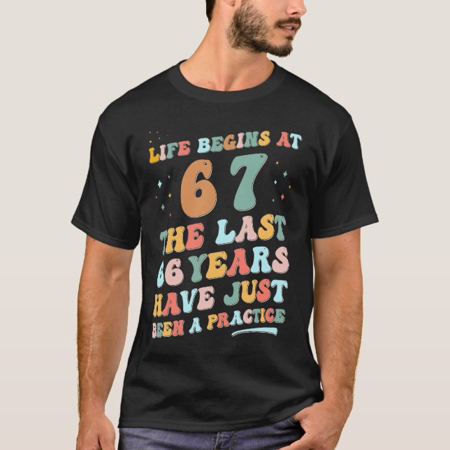 67th birthday Man Woman 2023 Groovy Life begins at T-Shirt (Front)