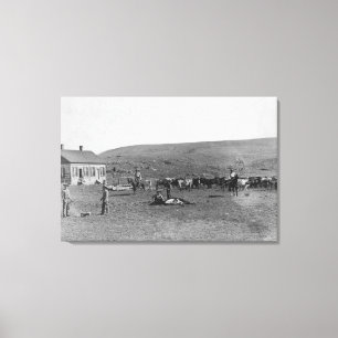 6 Cowboys Branding Cattle Near House Photograph Canvas Print
