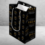 70th Birthday 1954 Black Gold Chic Elegant Medium Gift Bag<br><div class="desc">70th Birthday Chic 1954 Themed Black & Gold Elegant Gift Bags. Celebrate the journey of the vintage years with our 70th Birthday 1954 Black and Gold Chic Elegant Gift Bags. Wrapped in class and elegance, these high-quality gift bags offer a fully personalized touch, reflecting the chic vibes of the birthday....</div>