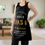 70th Birthday 1954 Name Chic Elegant Black Gold Apron<br><div class="desc">Elegant Black & Gold Chic Apron - 70th Birthday 1954 Name Personalized Kitchen & BBQ Essentials. Celebrate a fabulous birthday with style and practicality! This Elegant Black & Gold Chic Apron, personalized for those born in 1954, is the perfect accessory for the culinary enthusiast in your life. Its eye-catching design,...</div>