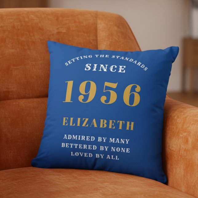 70th Birthday 1956 Add Name Blue Gold Personalized Throw Pillow (1956 Throw pillow on an orange chair.)
