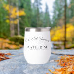 70th Birthday-70 & Still Shining! Black and White Thermal Wine Tumbler<br><div class="desc">Toast to 70 years of brilliance with this stainless steel wine tumbler! Featuring the cheerful phrase "70 & Still Shining, " it’s a meaningful and practical milestone birthday gift for anyone celebrating this special age. This trendy super cute personalized stemless wine glass makes a great gift for a fantastic woman...</div>