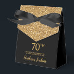 70th Birthday Black Gold Glitter Thank You Favor Boxes<br><div class="desc">This fabulous modern 70th Birthday Black Gold Glitter Thank You favor box with sparkling gold glitter, the birthday girl's name in a trendy script font, and tied with an elegant black bow would be perfect for your event. It would be great for a candy station, on a thank you gift...</div>