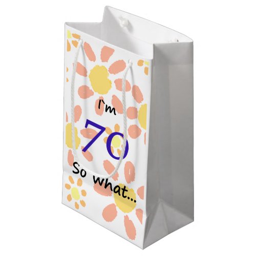 70th Birthday Funny I`m 70 so what... Small Gift Bag - For someone celebrating 70th birthday. It comes with a funny quote I`m 70 so what... on yellow and orange flowers, and is perfect for a person with a sense of humor.