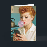 70th Birthday Lucille Ball Texting On a Cell Phone Card<br><div class="desc">A woman with vintage red,  curly hair blows a bubble with pink gum while texting on her smartphone in a retro kitchen for her 70th birthday.
Age and year can be changed.</div>