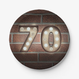 70th birthday marquee sign on brick wall paper plates