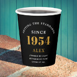 70th Birthday Name 1954 Black Gold Elegant Chic Paper Cups<br><div class="desc">Sophisticated 70th Birthday Unique Black & Gold Party Paper Cups. Celebrating a milestone birthday should be a memorable experience, and what better way to ensure that than with our sophisticated black and gold 70th Birthday Party Paper Cups? Designed in sleek black with an elegant gold highlight, these cups are printed...</div>