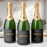70th Birthday Name 1955 Black Gold Elegant Chic Sparkling Wine Label<br><div class="desc">Vintage Birthday Black & Gold Elegant Label. Celebrate your milestone with our exclusive sparkling wine birthday label. The meticulously designed label with stunning black and gold hues effortlessly enhances the visual appeal of your favorite sparkling wine. The year prominently featured on the label, adds a nostalgic throwback to the year...</div>