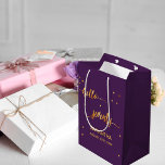 70th birthday purple gold hello 70 name script medium gift bag<br><div class="desc">Elegant and modern for a 70th birthday party.  Dark purple backdrop and faux gold text written with a trendy hand-lettered style script: hello seventy. With golden dots as decor. Templates for name and date,  golden letters.</div>